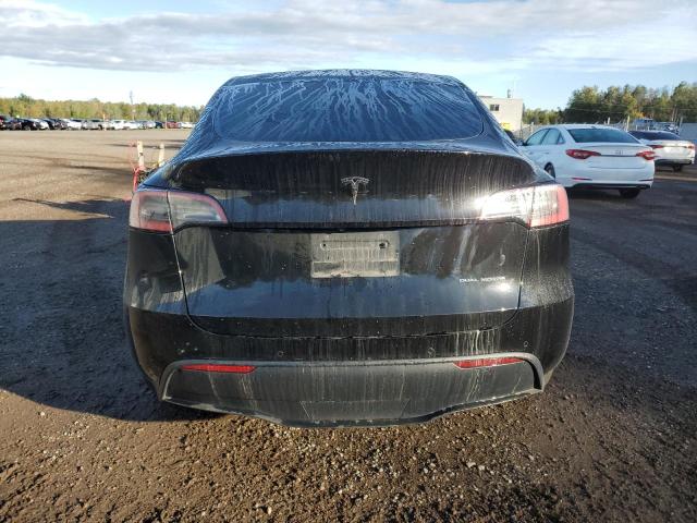 Photo 6 from auction – 2021 TESLA MODEL Y with VIN 5YJYGDEE3MF067239
