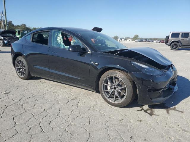 Снимка 4 от търг – 2021 TESLA MODEL 3 с VIN 5YJ3E1EA5MF047652