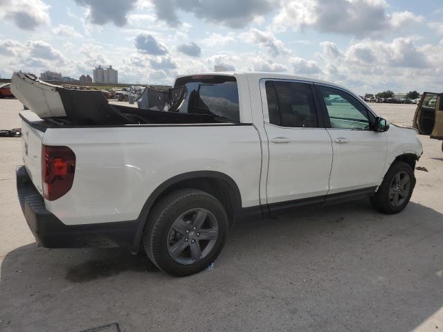 Photo 3 from auction – 2023 HONDA RIDGELINE with VIN 5FPYK3F53PB025107