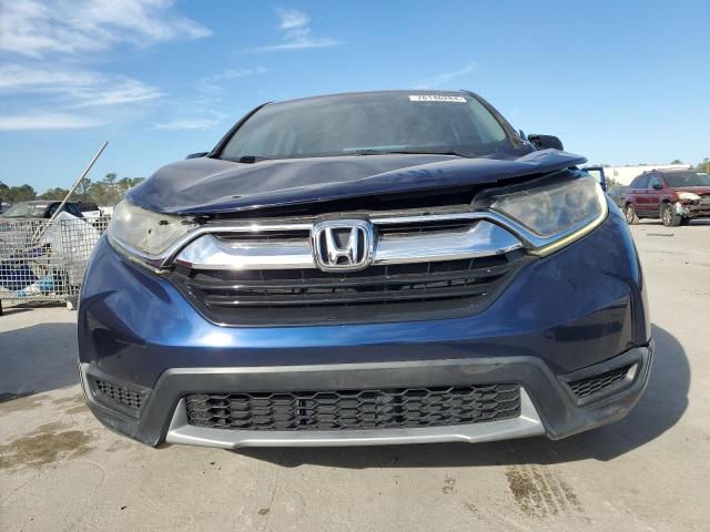 Photo 5 from auction – 2017 HONDA CR-V LX with VIN 7FARW5H35HE004693