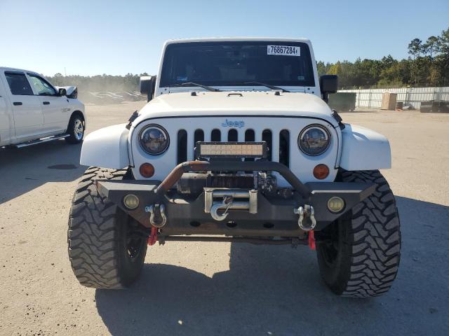 Photo 5 from auction – 2013 JEEP WRANGLER U with VIN 1C4BJWEG4DL638903