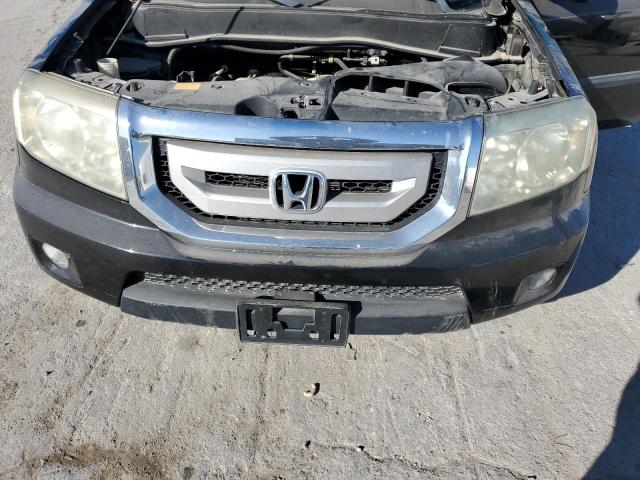 Photo 12 from auction – 2010 HONDA PILOT LX with VIN 5FNYF4H20AB014059