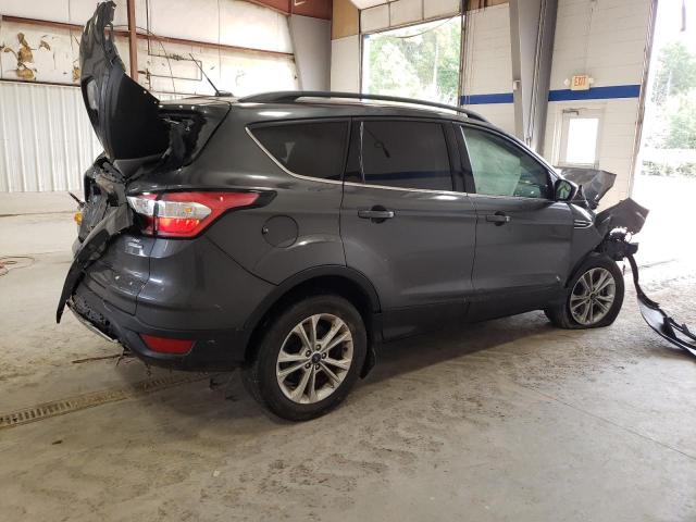 Photo 3 from auction – 2018 FORD ESCAPE SE with VIN 1FMCU9GD4JUC04434