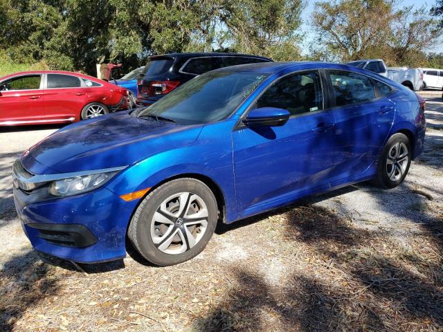HONDA CIVIC LX 2018 with VIN 19XFC2F52JE038080 - Photo from auction