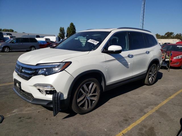 HONDA PILOT ELIT 2017 with VIN 5FNYF6H02HB098857 - Photo from auction