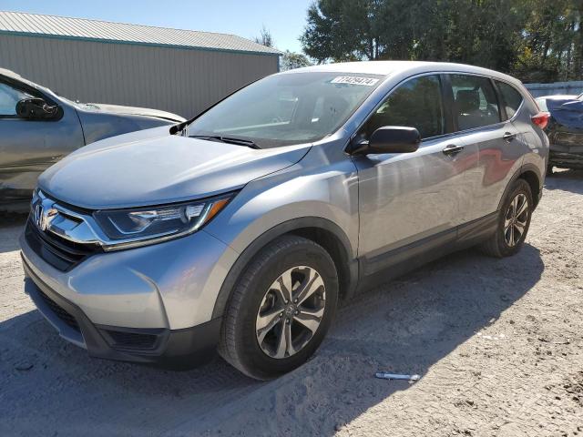 Photo 1 from auction – 2017 HONDA CR-V LX with VIN 7FARW5H37HE005909