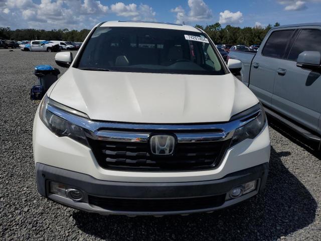 Photo 5 from auction – 2019 HONDA RIDGELINE with VIN 5FPYK3F70KB032140