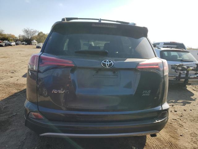Photo 6 from auction – 2016 TOYOTA RAV4 XLE with VIN JTMRFREV4GJ077618