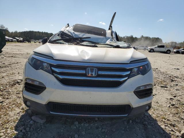 Photo 5 from auction – 2016 HONDA PILOT ELIT with VIN 5FNYF6H05GB041034