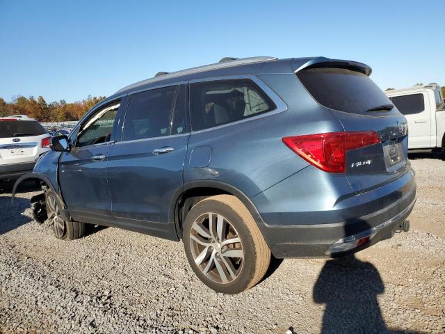 Photo 2 from auction – 2018 HONDA PILOT ELIT with VIN 5FNYF6H02JB041872