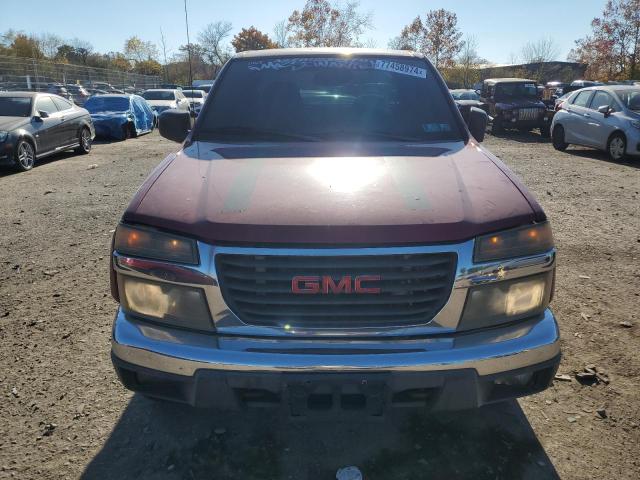 Photo 5 from auction – 2005 GMC CANYON with VIN 1GTDS196758114871