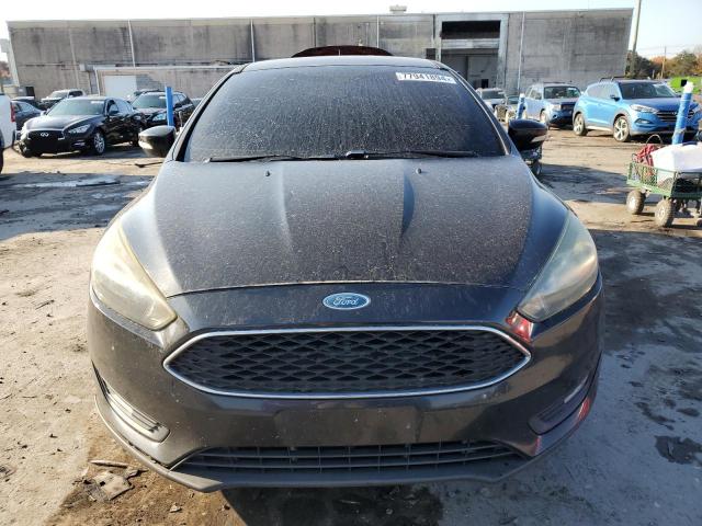 Photo 5 from auction – 2015 FORD FOCUS SE with VIN 1FADP3F21FL340004
