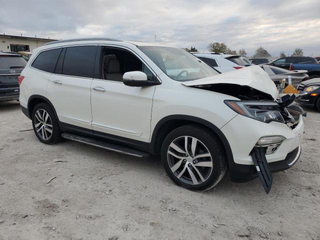 Photo 4 from auction – 2016 HONDA PILOT ELIT with VIN 5FNYF6H08GB116485
