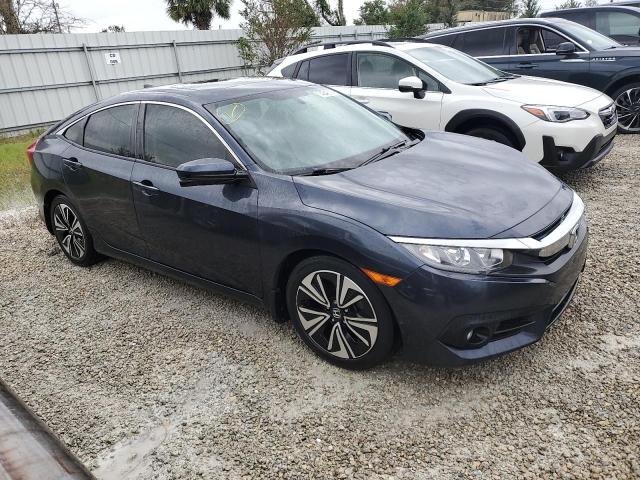 Photo 4 from auction – 2018 HONDA CIVIC EX with VIN JHMFC1F37JX039670