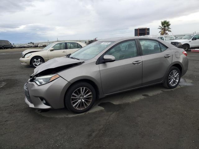 TOYOTA COROLLA L 2015 with VIN 5YFBURHE0FP182945 - Photo from auction