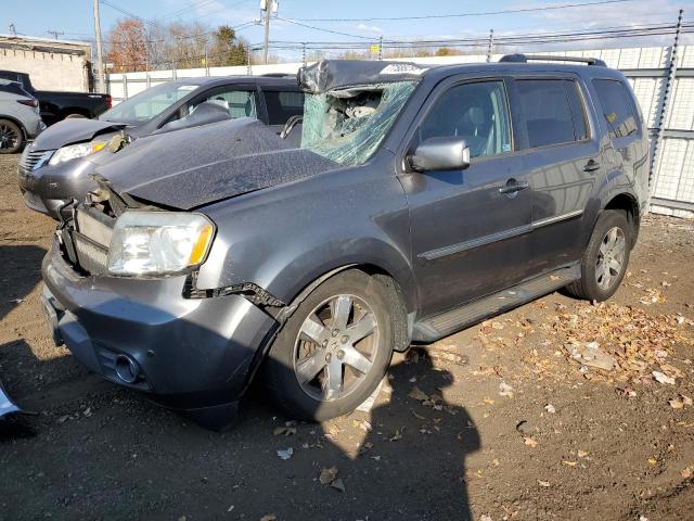 HONDA PILOT TOUR 2013 with VIN 5FNYF4H97DB057167 - Photo from auction