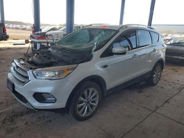 FORD ESCAPE TIT 2018 with VIN 1FMCU9J98JUC07888 - Photo from auction