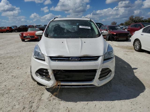 Photo 5 from auction – 2015 FORD ESCAPE TIT with VIN 1FMCU0J93FUA94564