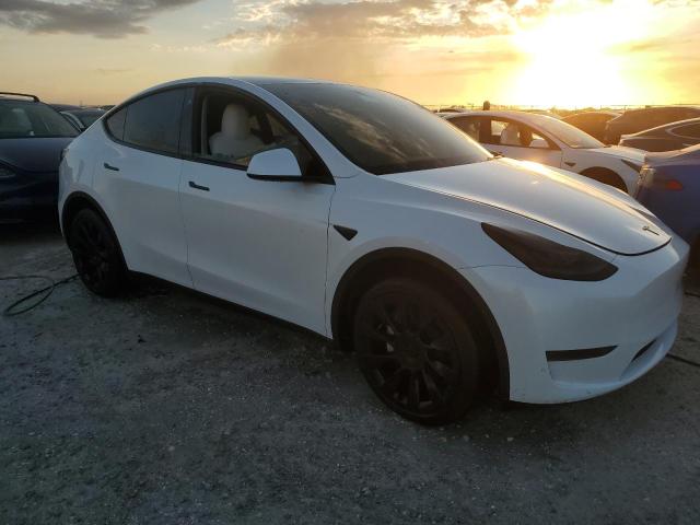 Photo 4 from auction – 2023 TESLA MODEL Y with VIN 7SAYGDEE1PF610286