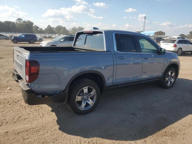 Photo 3 from auction – 2024 HONDA RIDGELINE with VIN 5FPYK3F55RB024012