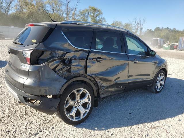 Photo 3 from auction – 2017 FORD ESCAPE TIT with VIN 1FMCU0J95HUA92348