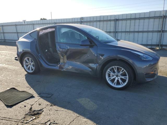 Photo 4 from auction – 2023 TESLA MODEL Y with VIN 7SAYGAEE7PF781090