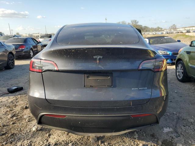 Photo 6 from auction – 2023 TESLA MODEL Y with VIN 7SAYGDEE1PA211410