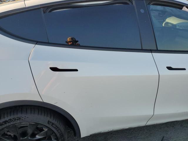 Photo 11 from auction – 2021 TESLA MODEL Y with VIN 5YJYGAEE0MF196814