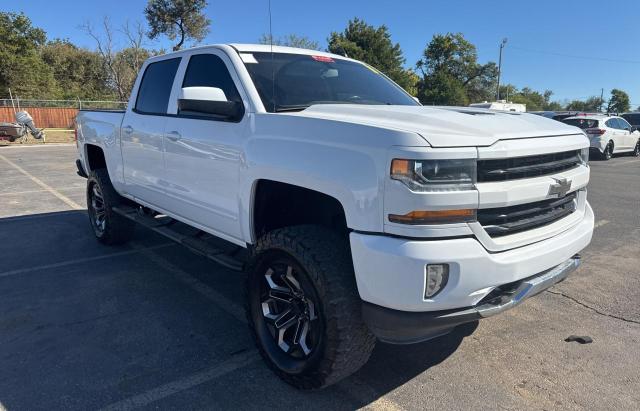 CHEVROLET SILVERADO 2018 with VIN 3GCUKREC4JG528964 - Photo from auction