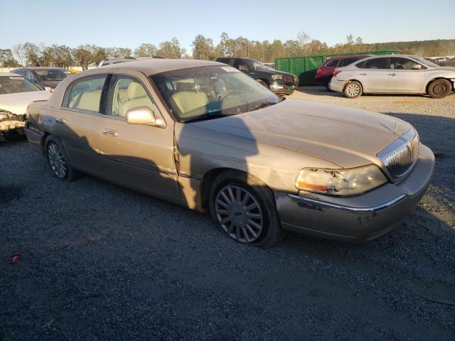 Photo 4 from auction – 2004 LINCOLN TOWN CAR E with VIN 1LNHM81W74Y633171