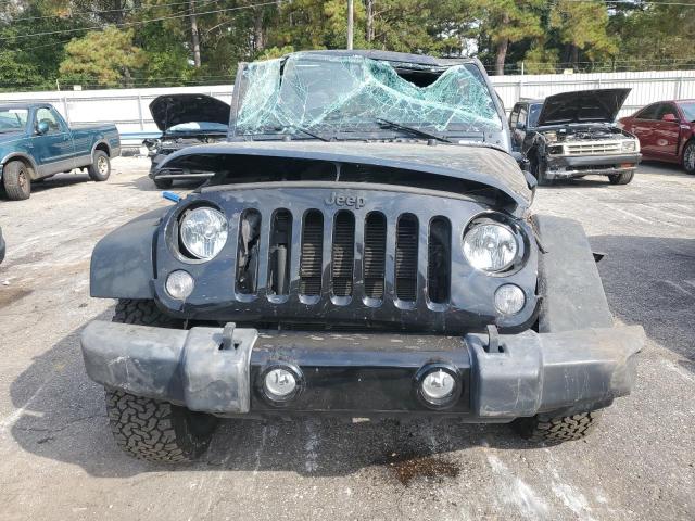 Photo 5 from auction – 2016 JEEP WRANGLER U with VIN 1C4BJWDG4GL326859