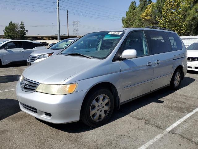 HONDA ODYSSEY 2004 with VIN 5FNRL18004B003853 - Photo from auction