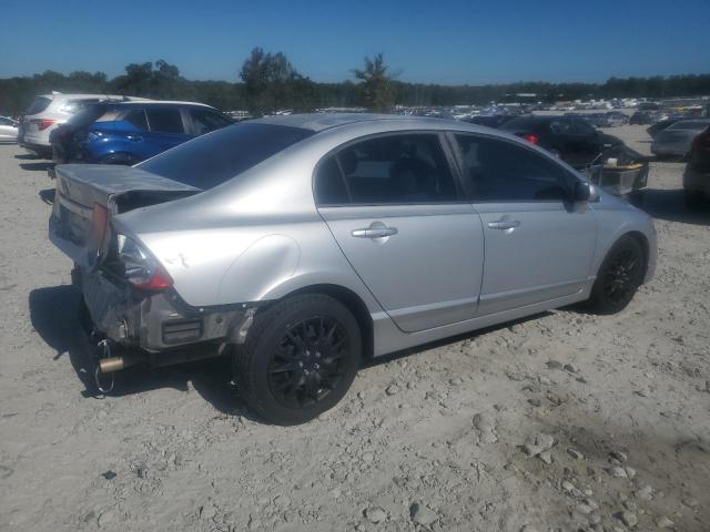 Photo 3 from auction – 2011 HONDA CIVIC LX with VIN 2HGFA1F53BH519981