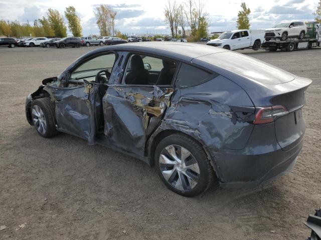 Photo 2 from auction – 2023 TESLA MODEL Y with VIN LRWYGDFD1PC221127