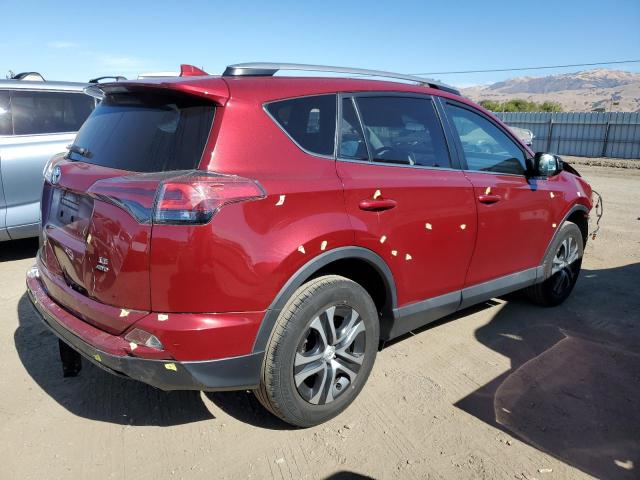 Photo 3 from auction – 2018 TOYOTA RAV4 LE with VIN 2T3BFREV6JW829569