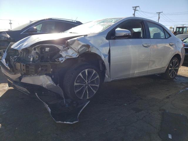 TOYOTA COROLLA L 2017 with VIN 5YFBURHE9HP683626 - Photo from auction