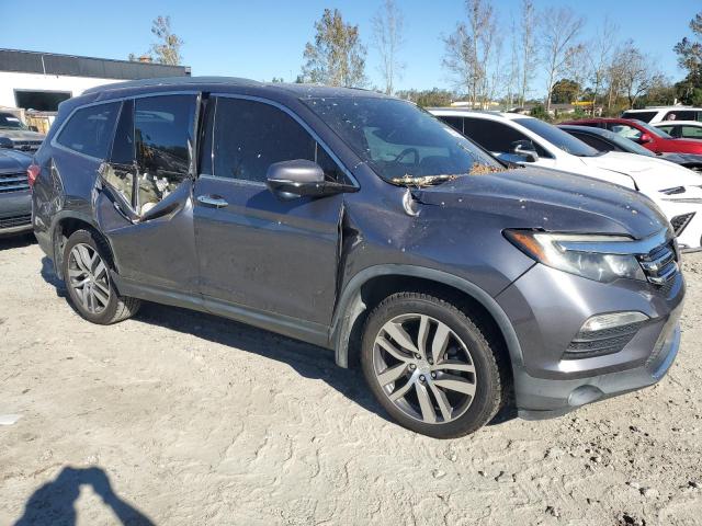 Photo 4 from auction – 2016 HONDA PILOT TOUR with VIN 5FNYF5H93GB057144