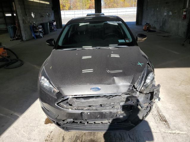 Photo 5 from auction – 2015 FORD FOCUS SE with VIN 1FADP3F24FL218494