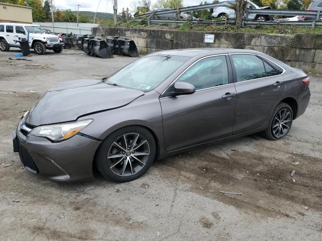 TOYOTA CAMRY LE 2017 with VIN 4T1BF1FKXHU649701 - Photo from auction