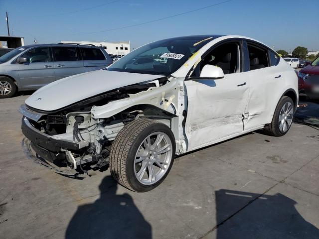 TESLA MODEL Y 2023 with VIN 7SAYGDEE8PA208732 - Photo from auction