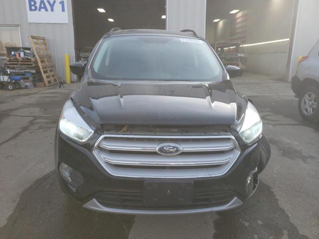 Photo 5 from auction – 2018 FORD ESCAPE SE with VIN 1FMCU9GD6JUA32536