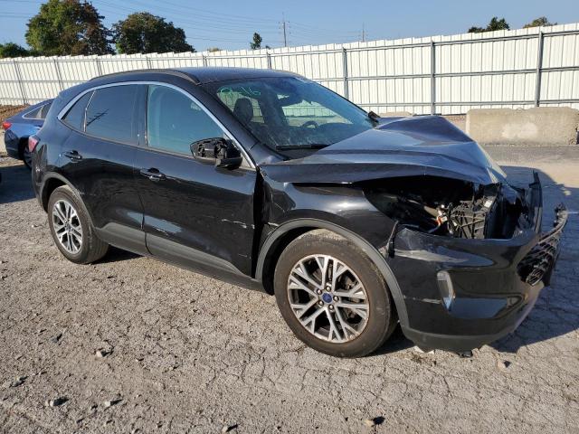 Photo 4 from auction – 2021 FORD ESCAPE SEL with VIN 1FMCU0H66MUB08174