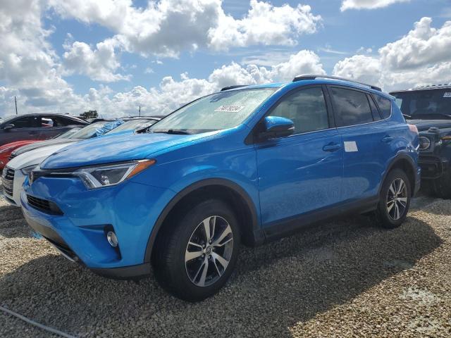 TOYOTA RAV4 XLE 2017 with VIN JTMWFREV9HJ714362 - Photo from auction