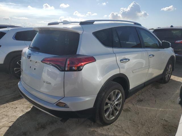 Photo 3 from auction – 2016 TOYOTA RAV4 LIMIT with VIN JTMYFREV2GD088191