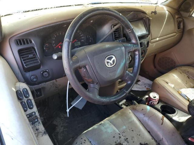 Photo 8 from auction – 2001 MAZDA TRIBUTE LX with VIN 4F2YU09181KM58507