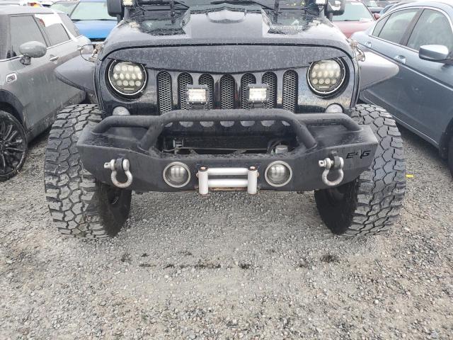 Photo 11 from auction – 2014 JEEP WRANGLER U with VIN 1C4BJWDGXEL231896