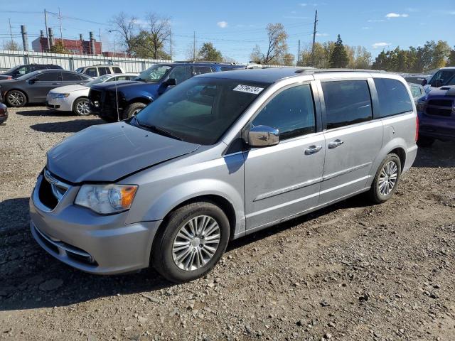 CHRYSLER TOWN & COU 2014 with VIN 2C4RC1CG5ER112559 - Photo from auction
