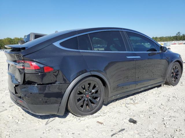 Photo 3 from auction – 2017 TESLA MODEL X with VIN 5YJXCDE20HF059151