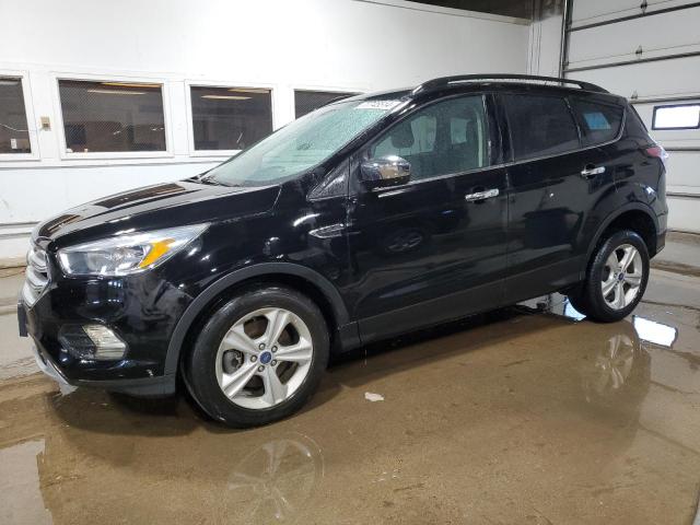 FORD ESCAPE SE 2018 with VIN 1FMCU9GDXJUC11193 - Photo from auction