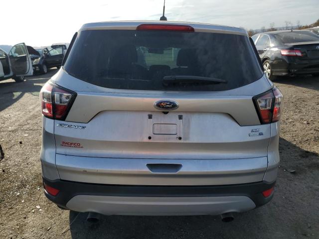 Photo 6 from auction – 2017 FORD ESCAPE SE with VIN 1FMCU9GD6HUA59276